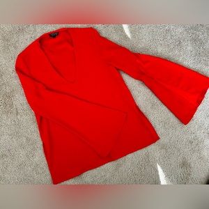 Topshop. Like new. Elegant red long sleeve blouse. Size US 4.